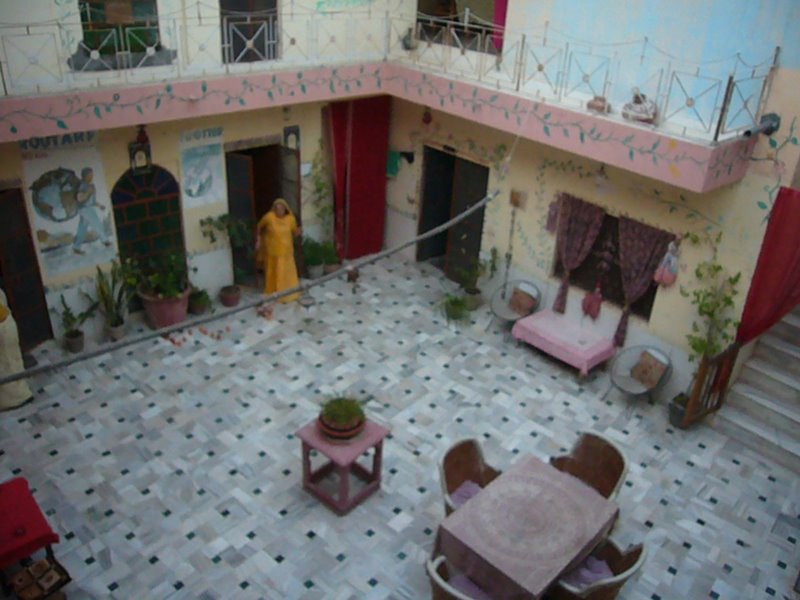 Govind's mother and the courtyard.